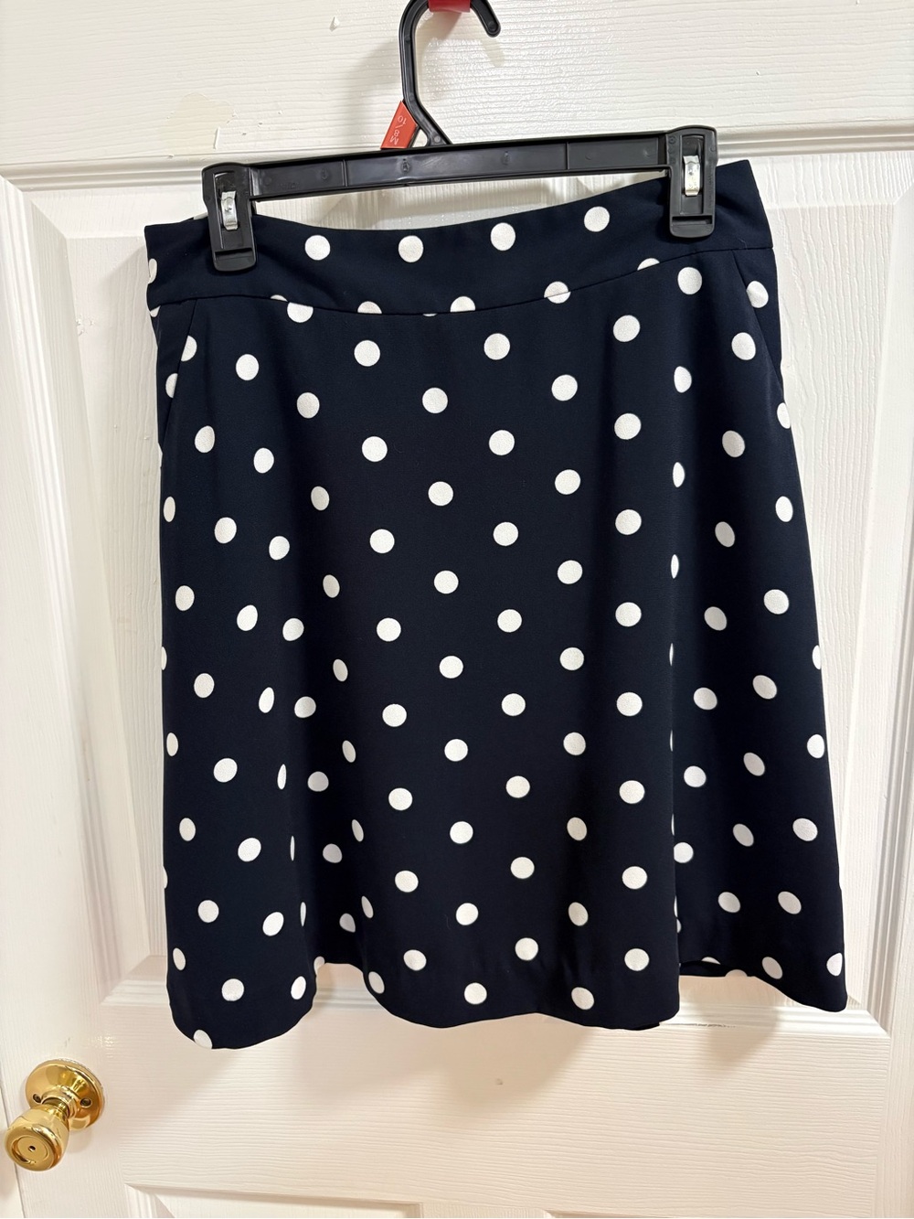 Ann Taylor factory navy and white polka dot skirt, fully lined, hip pockets